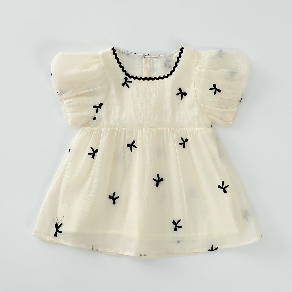 Embroidered bow dress