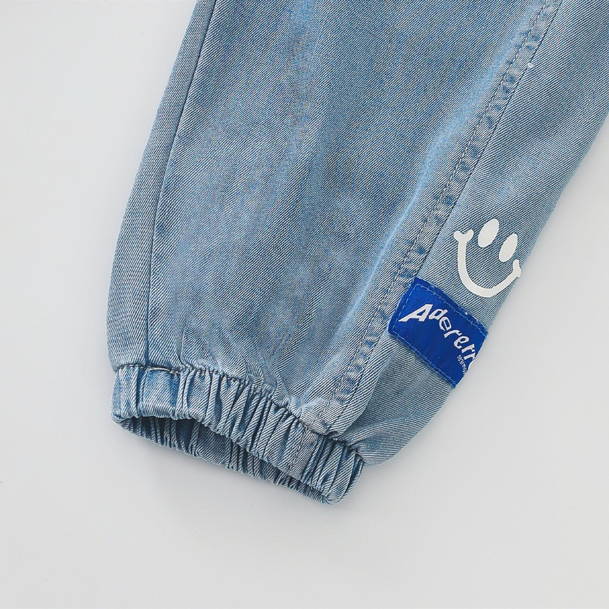 Smiley Face Tencel Denim Pants