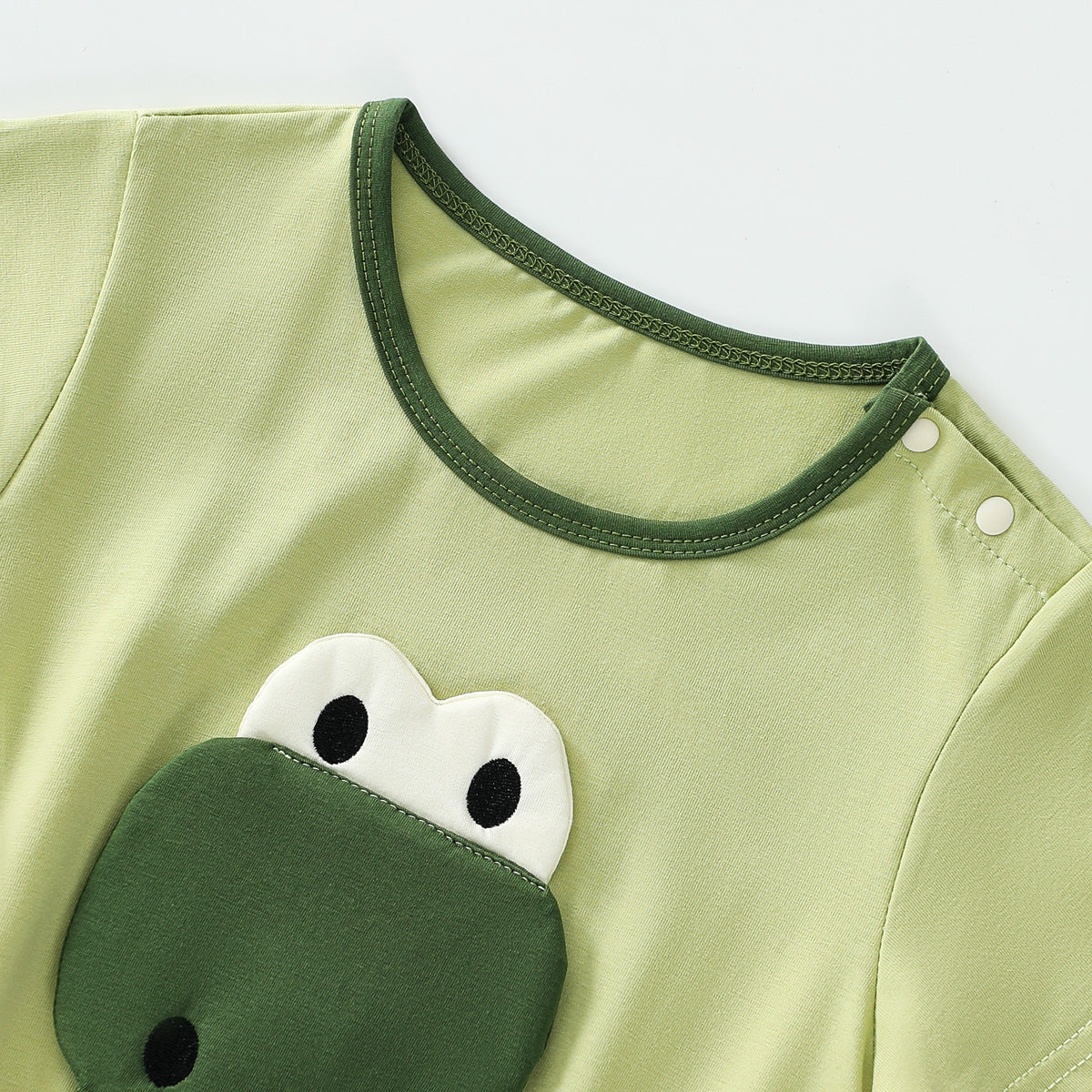 Dinosaur triangular romper