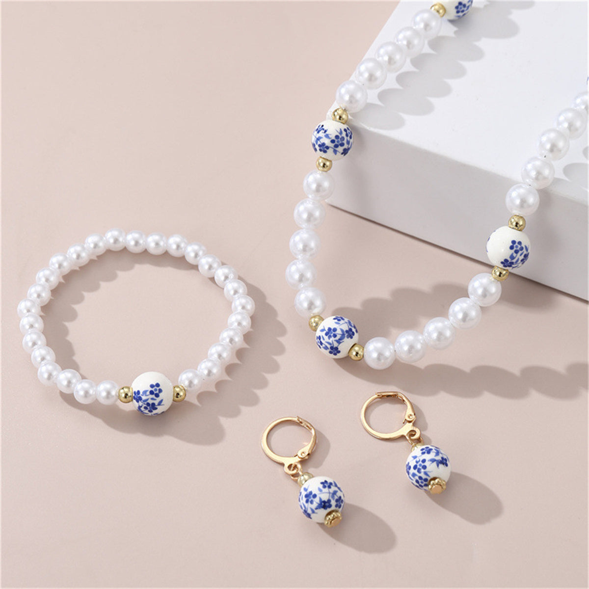 Children's 3-piece elegant temperament printed ceramic plum blossom shaped pearl jewelry set