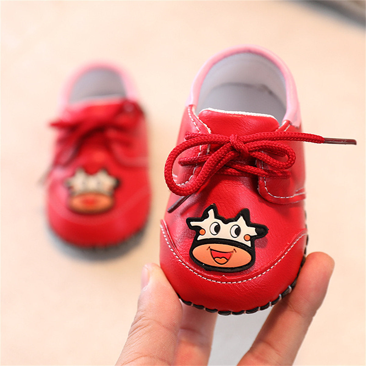 Cute calf pattern soft sole leather shoes for baby boys and girls