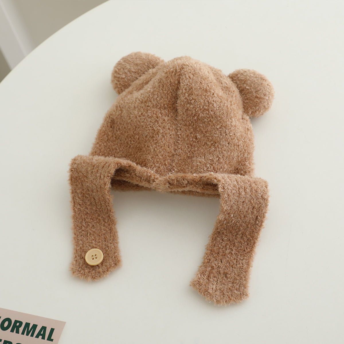 Children's woolen hat with fur ball