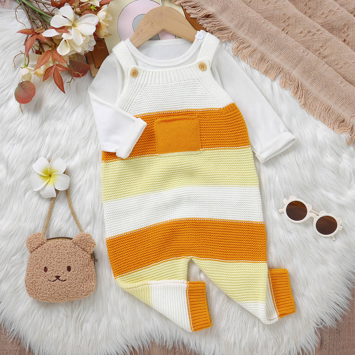 Infant and toddler long leg romper with tag stitching