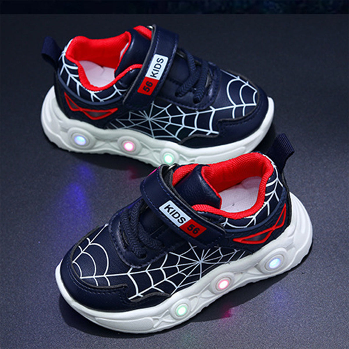 New children's cartoon sports shoes with lights in spring and autumn, leather spider web LED luminous children's shoes for 1-6 years old boys