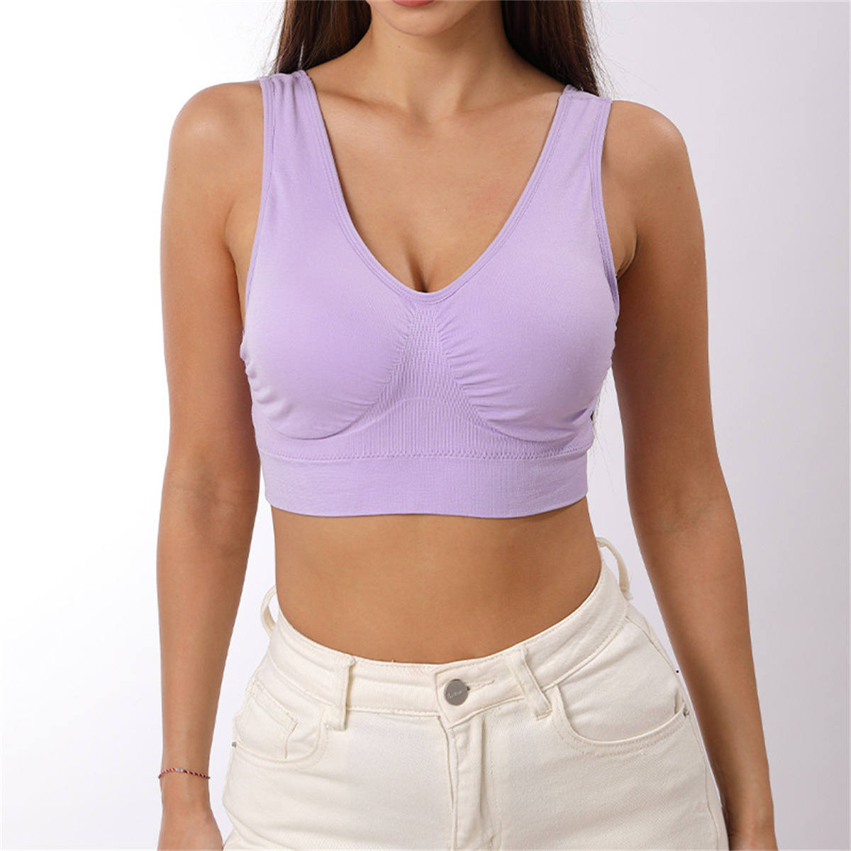 Women's vest style sports bra without underwire and with chest pads