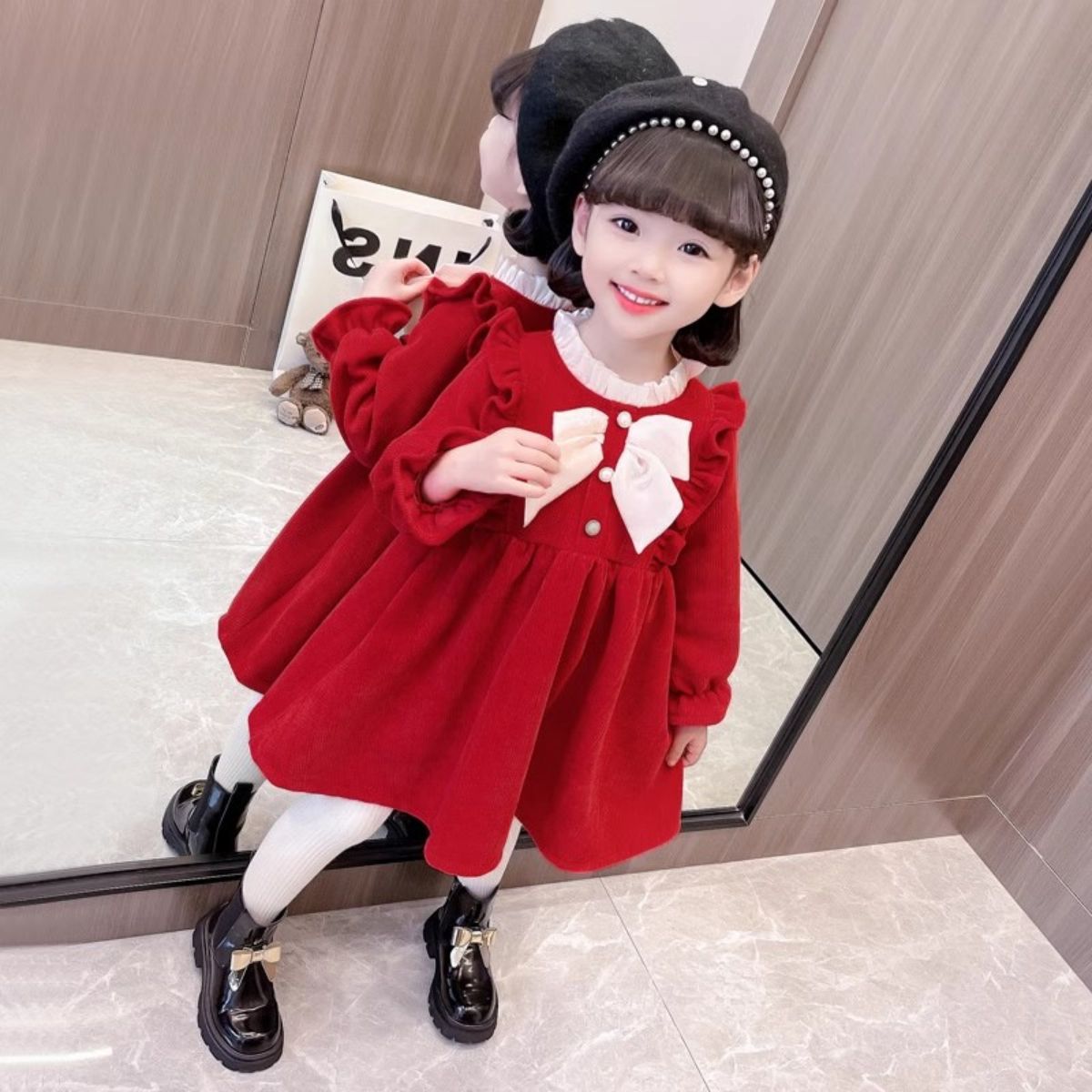 New sweet bow dress autumn and winter children's fashionable mid-length skirt