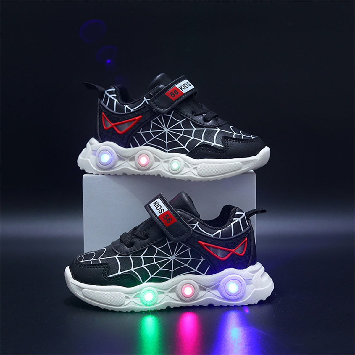 New children's cartoon sports shoes with lights in spring and autumn, leather spider web LED luminous children's shoes for 1-6 years old boys