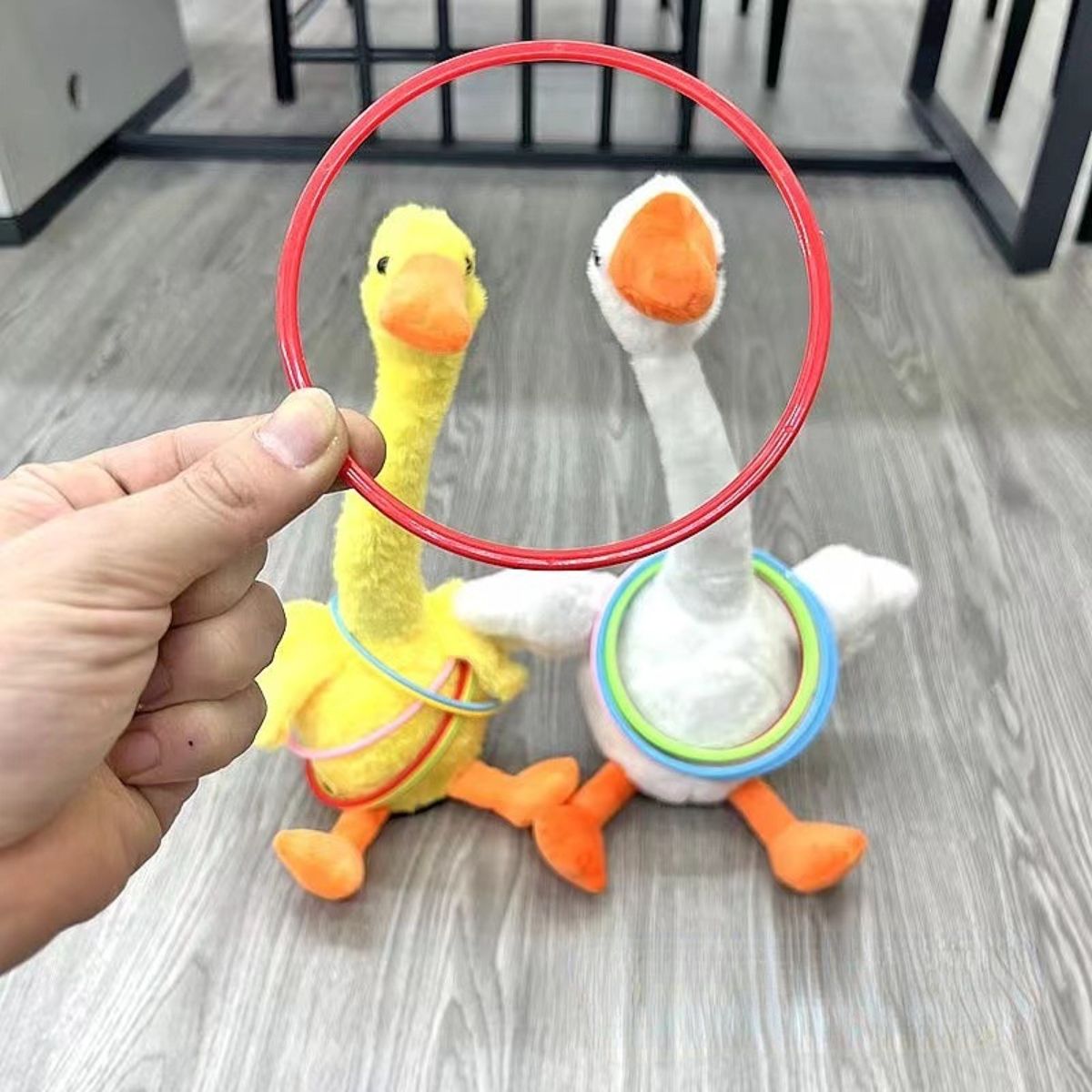 Ring tossing dancing duck electric toy