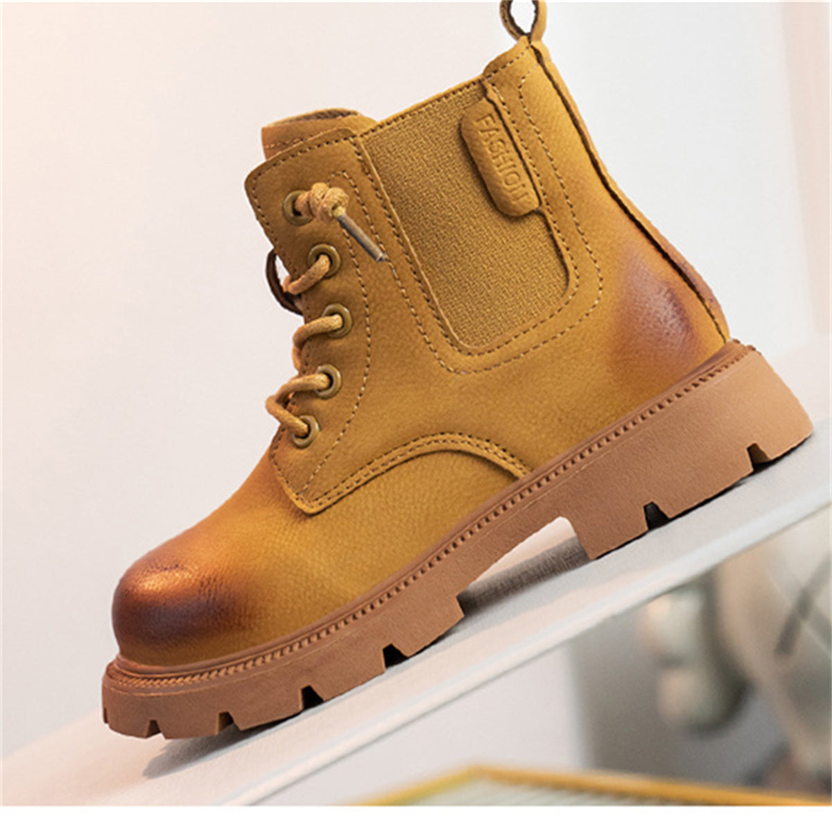 Middle and large boys autumn and winter solid color British style soft sole waterproof non-slip Martin boots