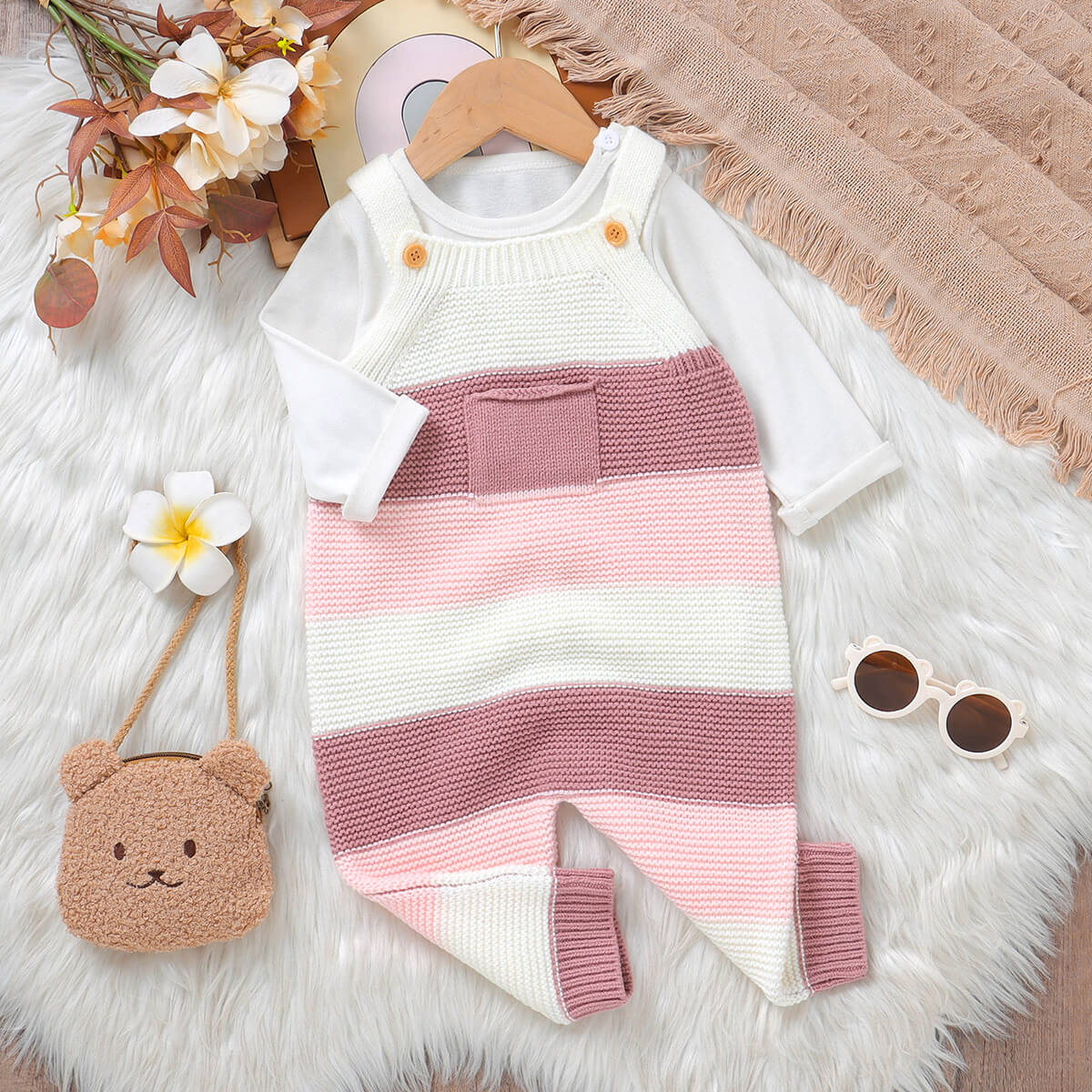 Infant and toddler long leg romper with tag stitching