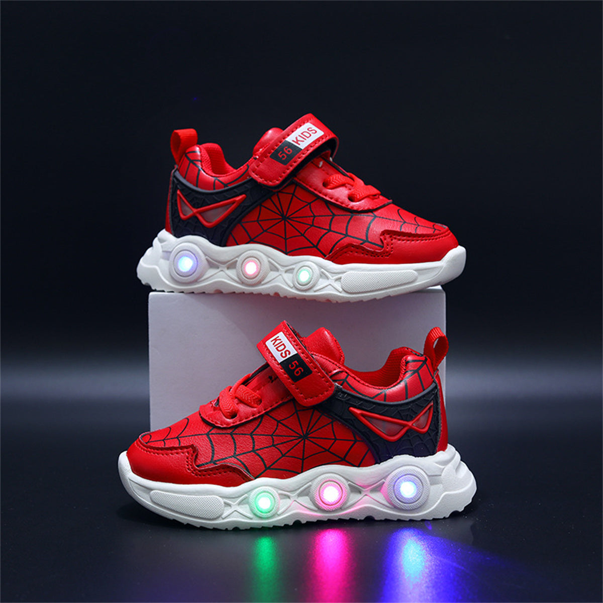 New children's cartoon sports shoes with lights in spring and autumn, leather spider web LED luminous children's shoes for 1-6 years old boys