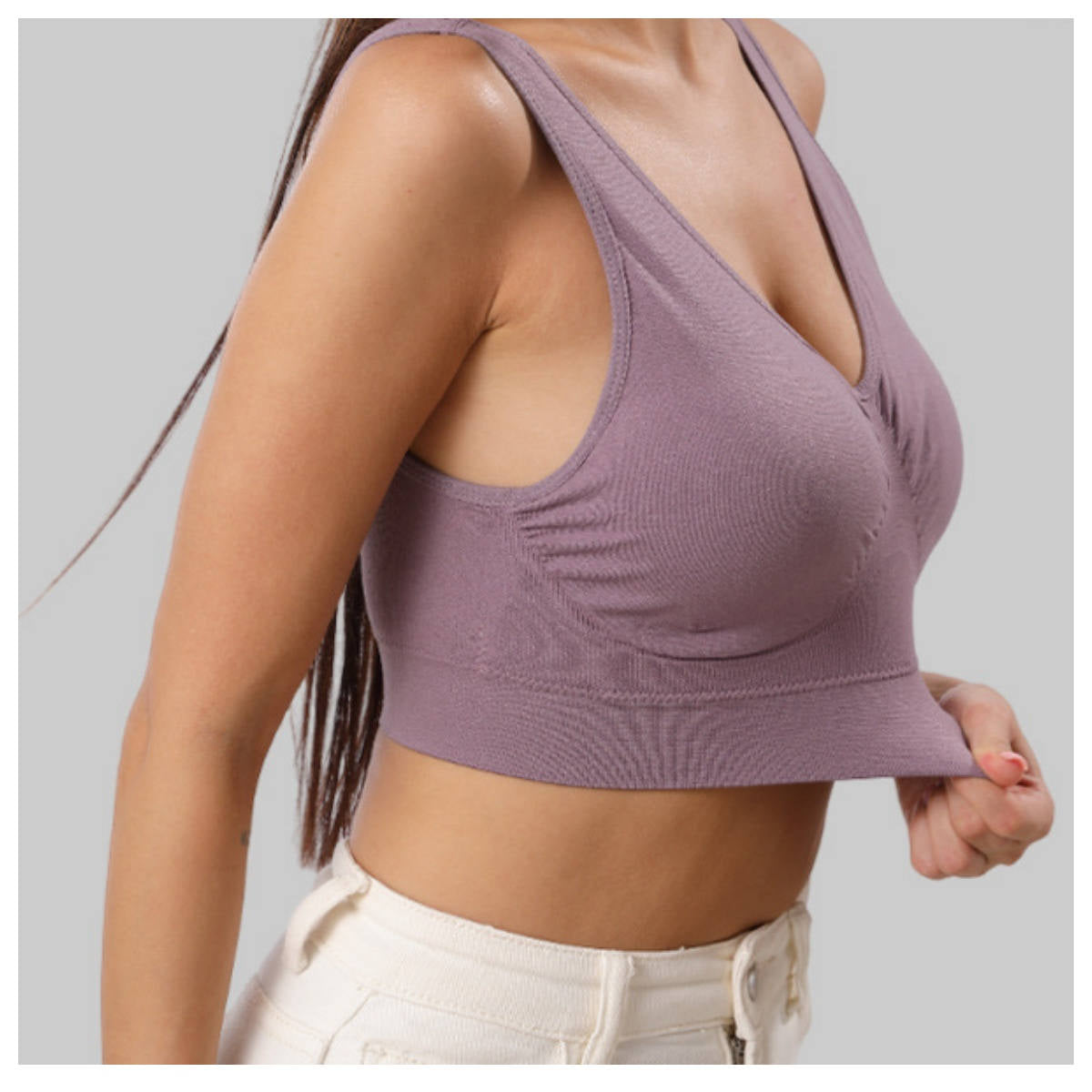 Women's vest style sports bra without underwire and with chest pads