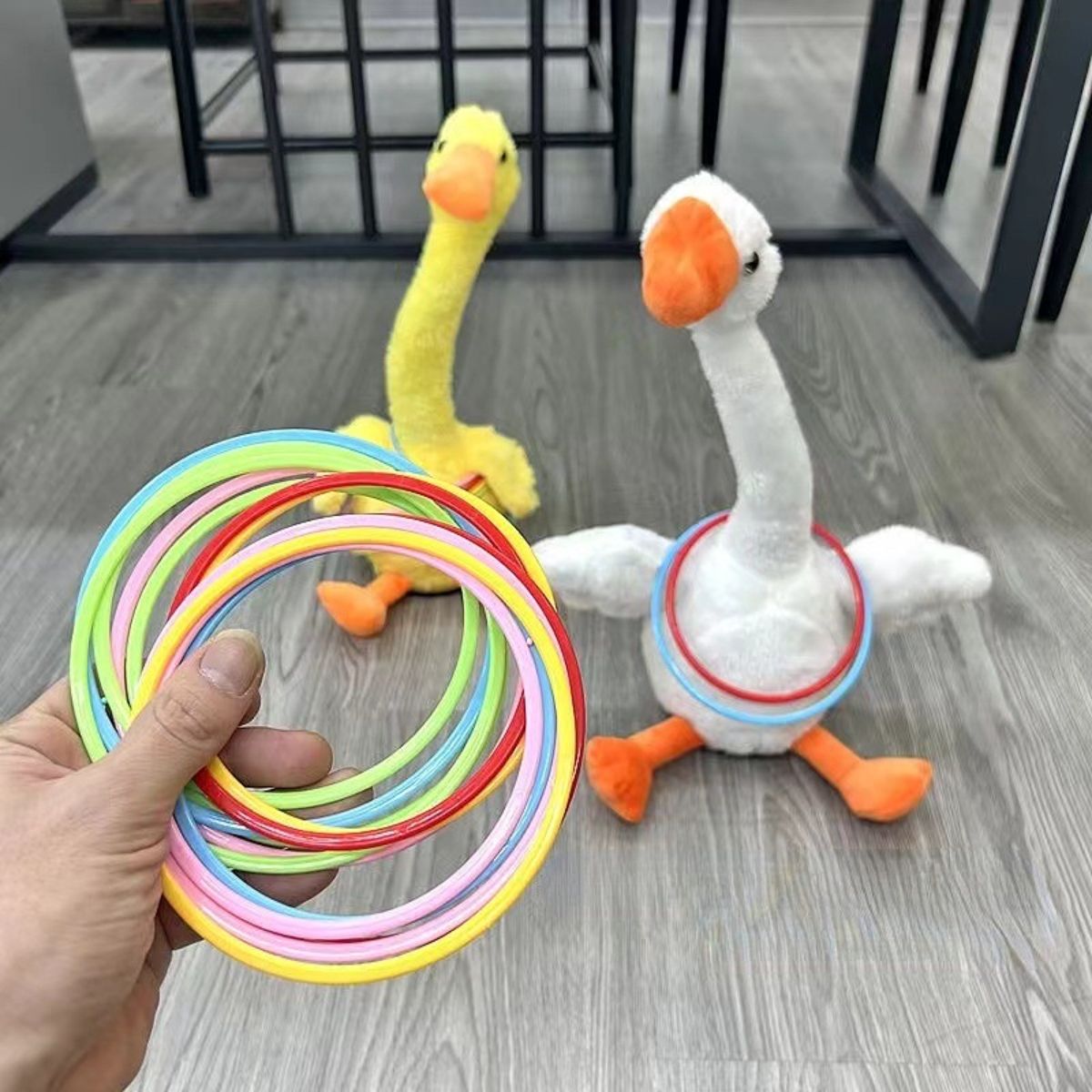 Ring tossing dancing duck electric toy