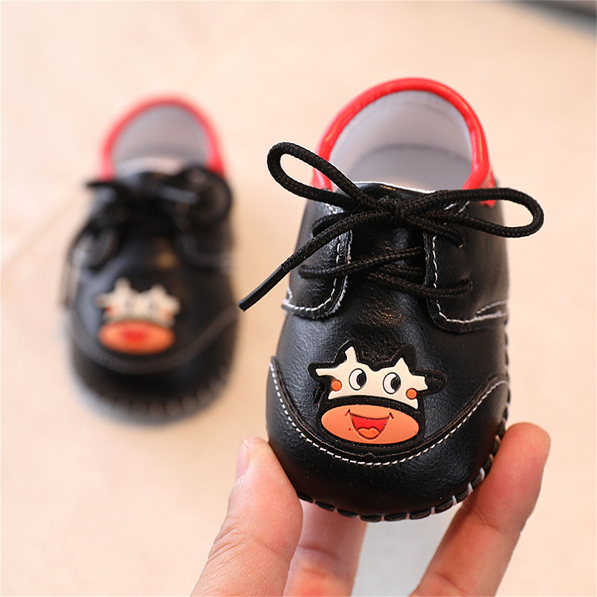 Cute calf pattern soft sole leather shoes for baby boys and girls