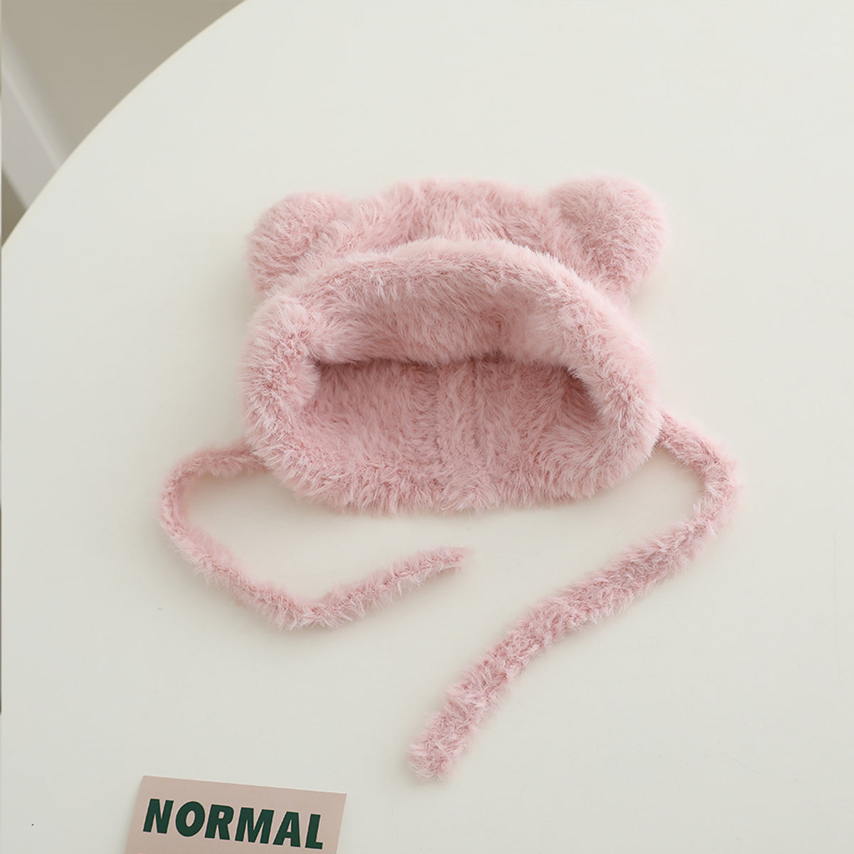 Children's woolen hat with fur ball