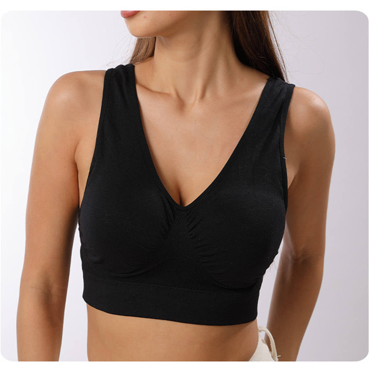 Women's vest style sports bra without underwire and with chest pads