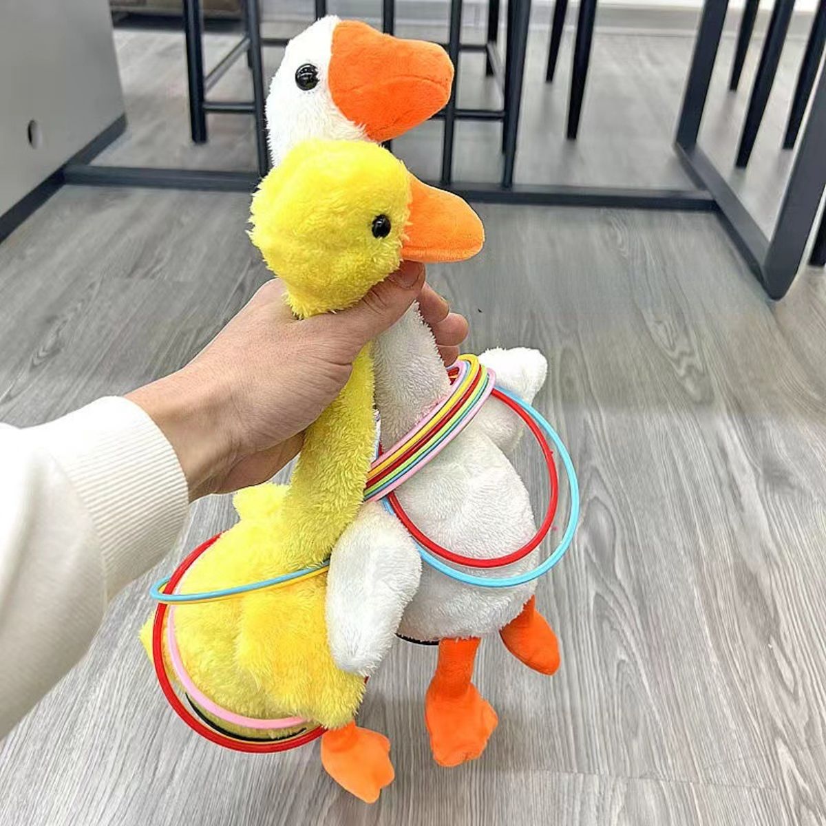 Ring tossing dancing duck electric toy