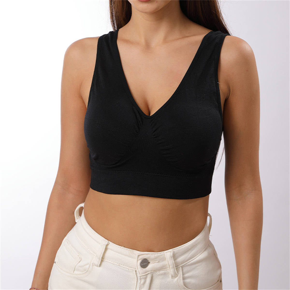 Women's vest style sports bra without underwire and with chest pads