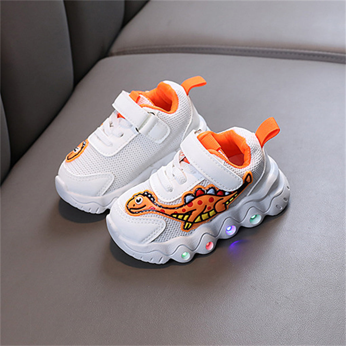 Children's and boys' spring and autumn cute dinosaur baby luminous LED Velcro breathable sports shoes