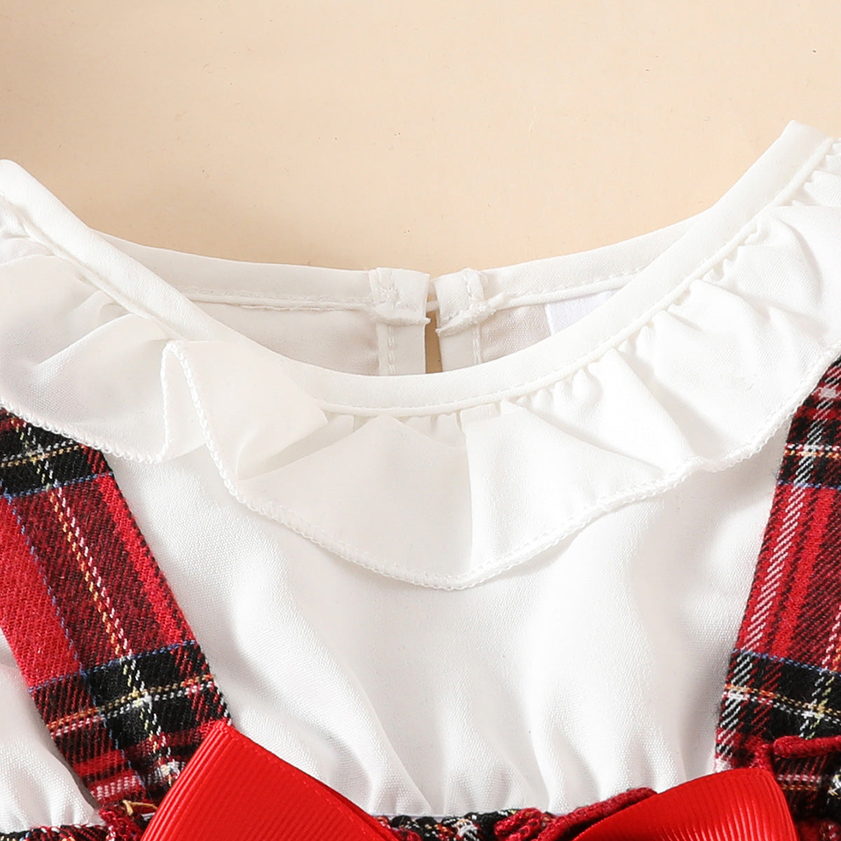 One-piece romper with suspender skirt in preppy style, featuring a Peter Pan collar, Christmas design