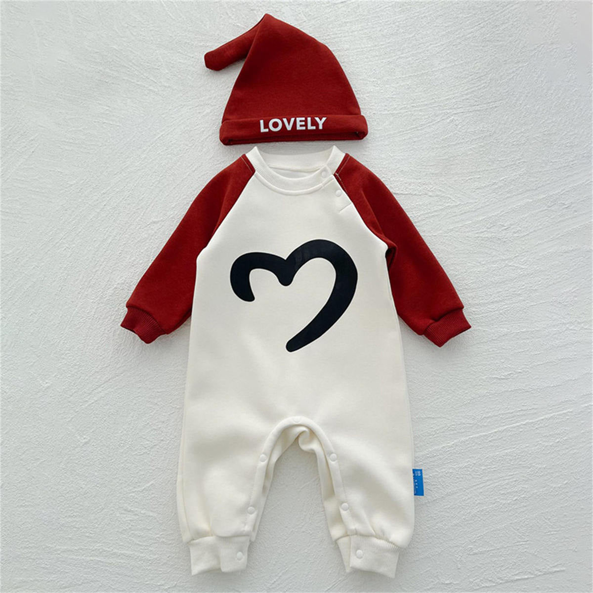 Baby onesie with hood and long sleeves with letters