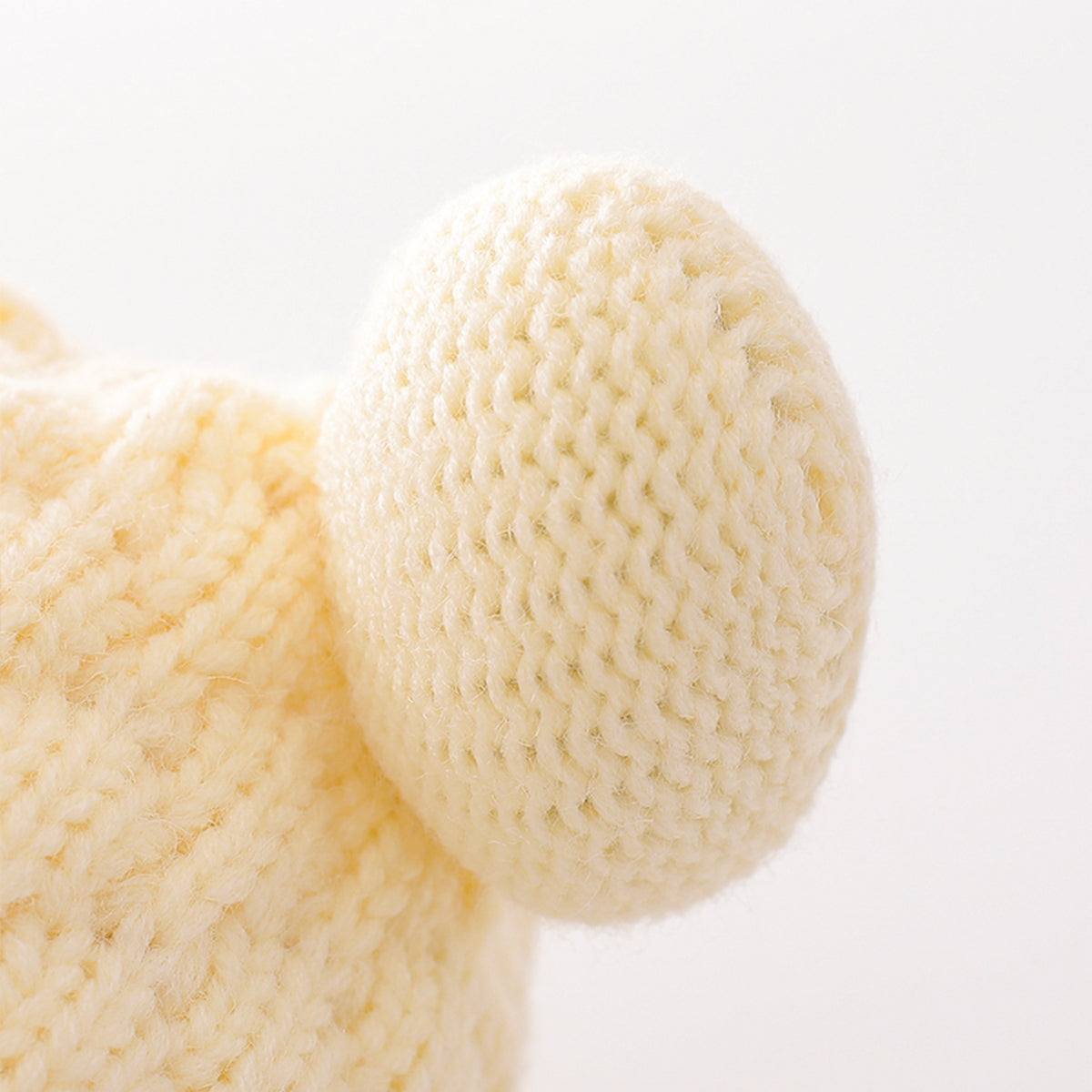 Children's woolen hat with fur ball