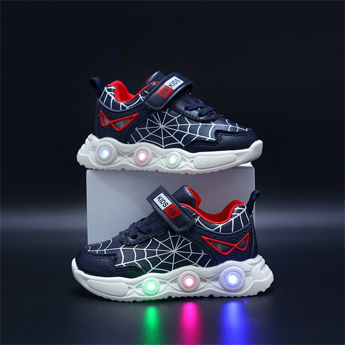 New children's cartoon sports shoes with lights in spring and autumn, leather spider web LED luminous children's shoes for 1-6 years old boys